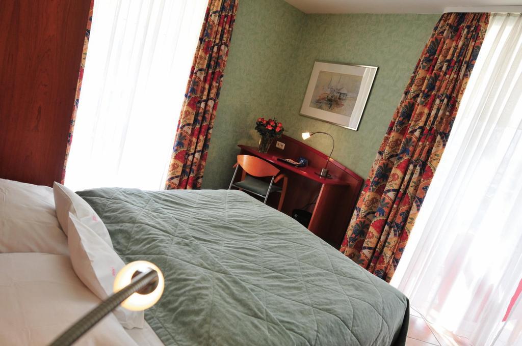 Hotel Mado Кёльн Номер фото